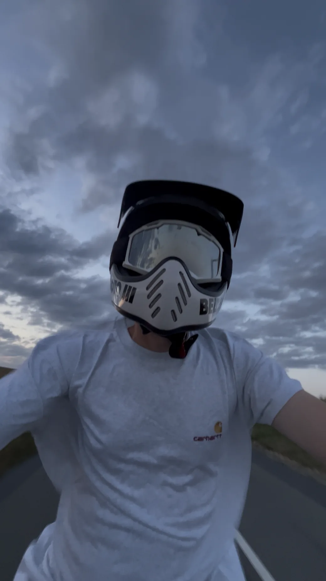 Erwan wearing a motocross helmet and goggles
